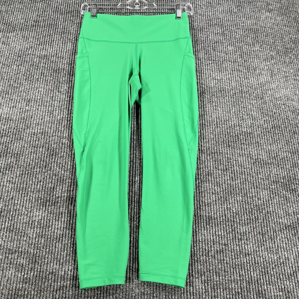 Athleta Leggings Womens Small Green Interval Stash 7/8 Tight Pocket Yoga